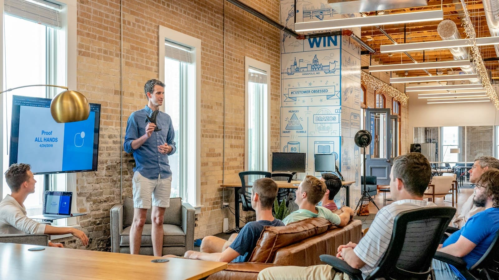 Team gathering for an all-hands presentation